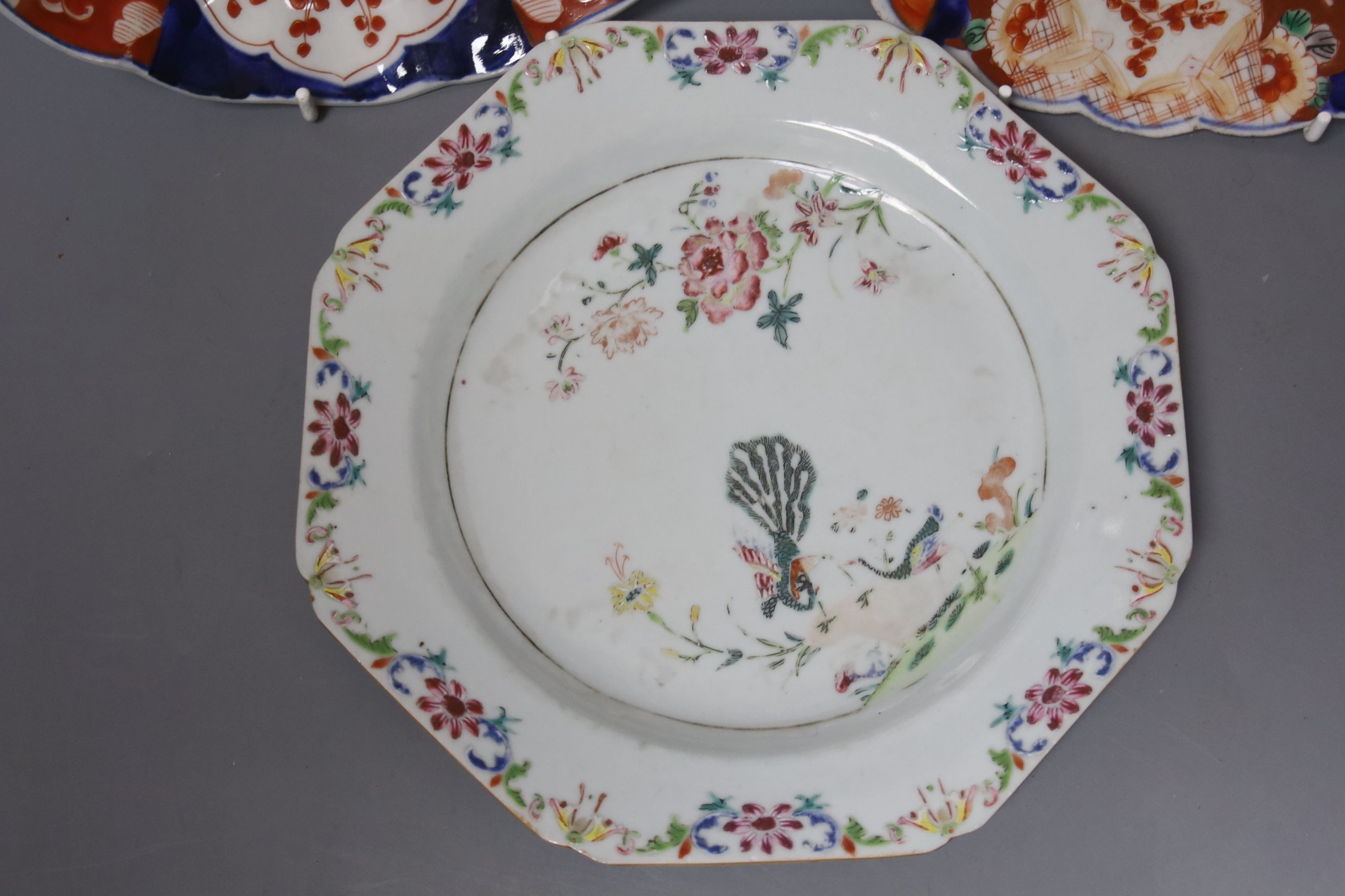 A Chinese Qianlong ‘double peacock’ octagonal plate, 21.5cm and two Imari dishes